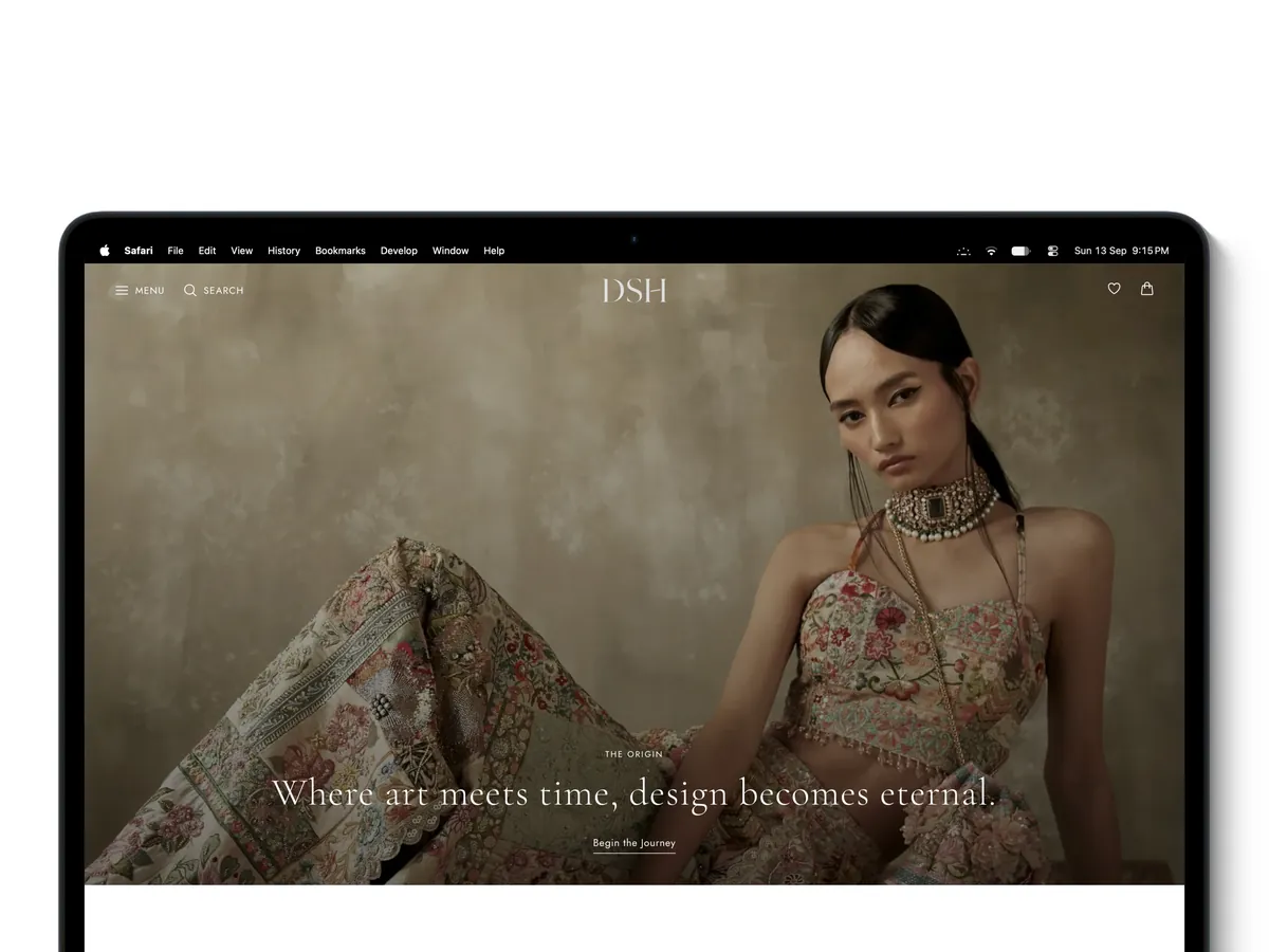 DSH fashion storefront on a laptop, showing an editorial campaign image